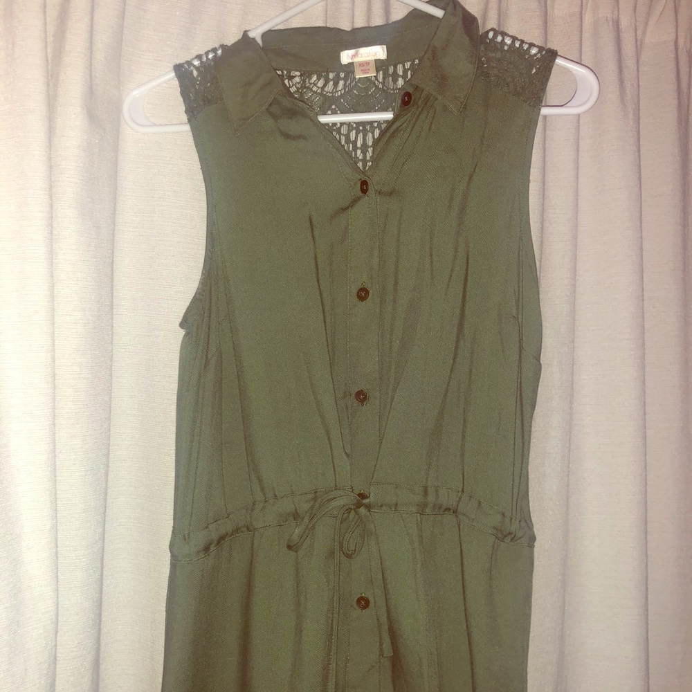 Green button down tank top.